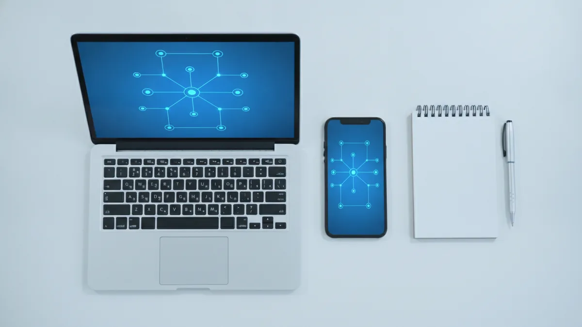 Overhead view of planning payments with a laptop and notes